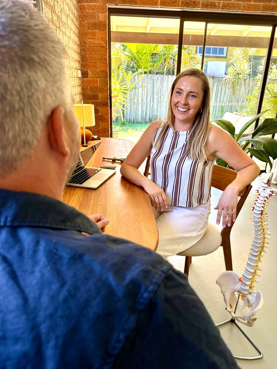 Dr. Kasia treating patient